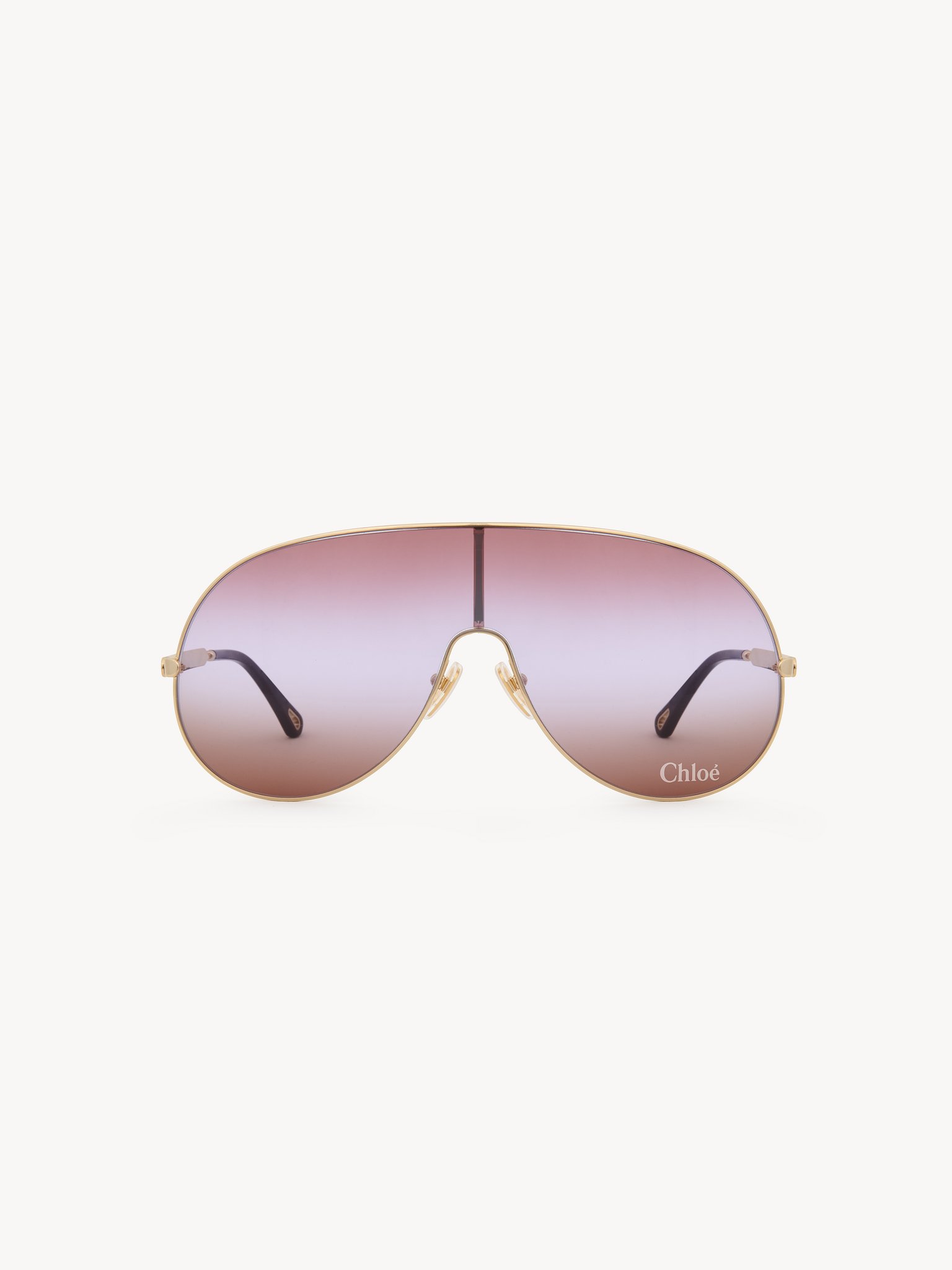 Aly sunglasses Gold metal & bio-based nylon
Gradient red, pink & brown lenses Back view of the product