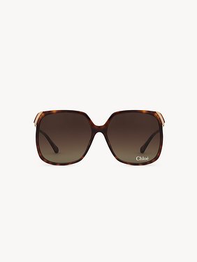 Aly sunglasses Havana lower-impact acetate, gold metal & bio-based nylon
Gradient brown lenses Back view of the product