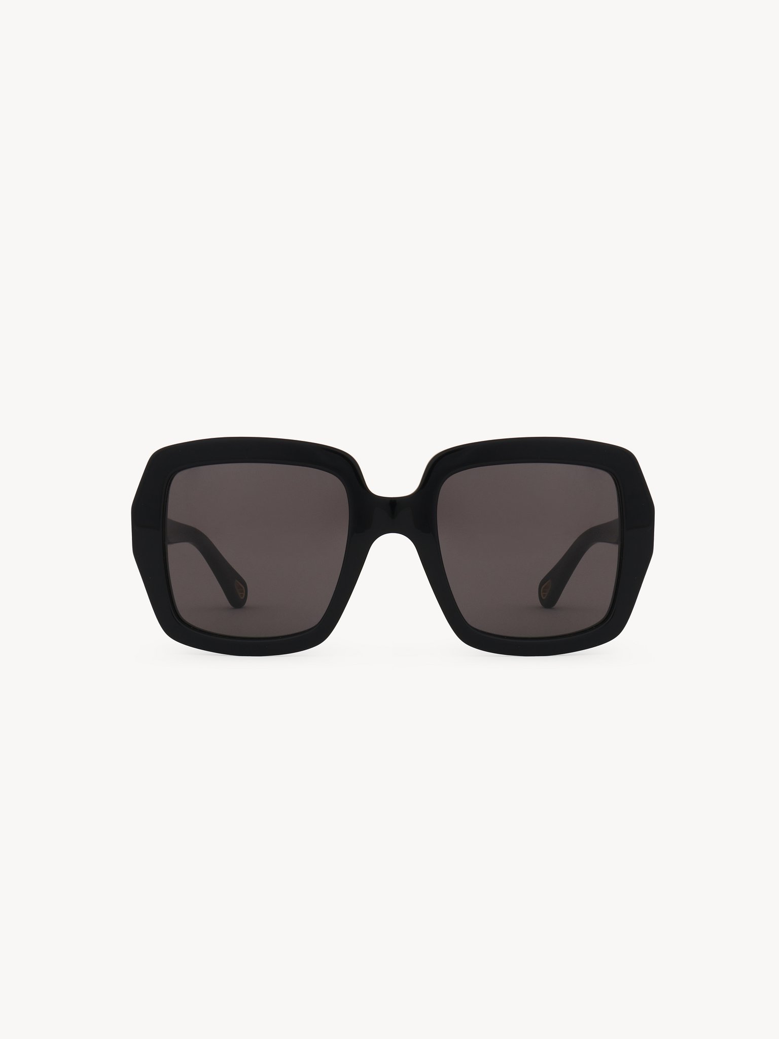 Marcie sunglasses Black lower-impact acetate & bio-based nylon
Solid gray lenses Back view of the product