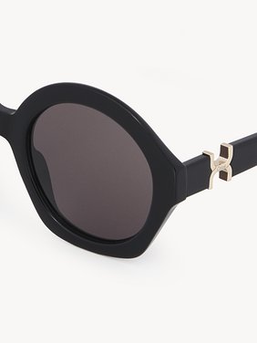 Marcie sunglasses Black lower-impact acetate & bio-based nylon
Solid gray lenses Top view of the product