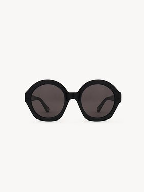 Marcie sunglasses Black lower-impact acetate & bio-based nylon
Solid gray lenses Back view of the product