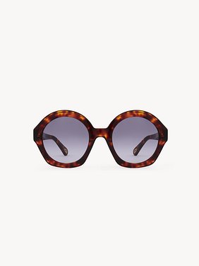 Marcie sunglasses Burnt Havana lower-impact acetate & bio-based nylon
Gradient violet lenses Back view of the product