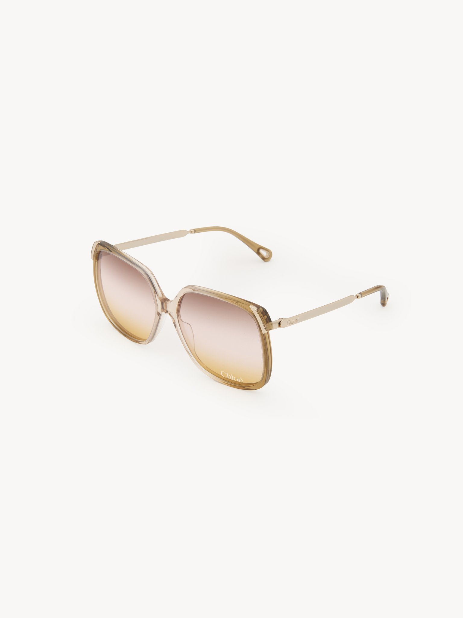 Lunettes de soleil Aly Acétate à impact réduit finition dégradée transparente rose clair & métal doré
Verres dégradés marron/rose clair/jaune