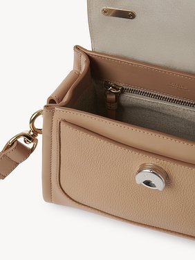 Mini Tess day bag in grained & soft leather Grained & shiny calfskin
Light Tan Front view of the product being worn