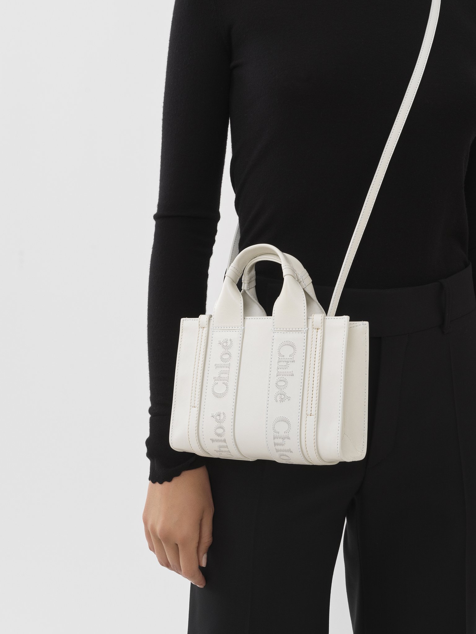 Mini Woody tote bag in soft leather Smooth calfskin with Chloé logo
White Back view of the product