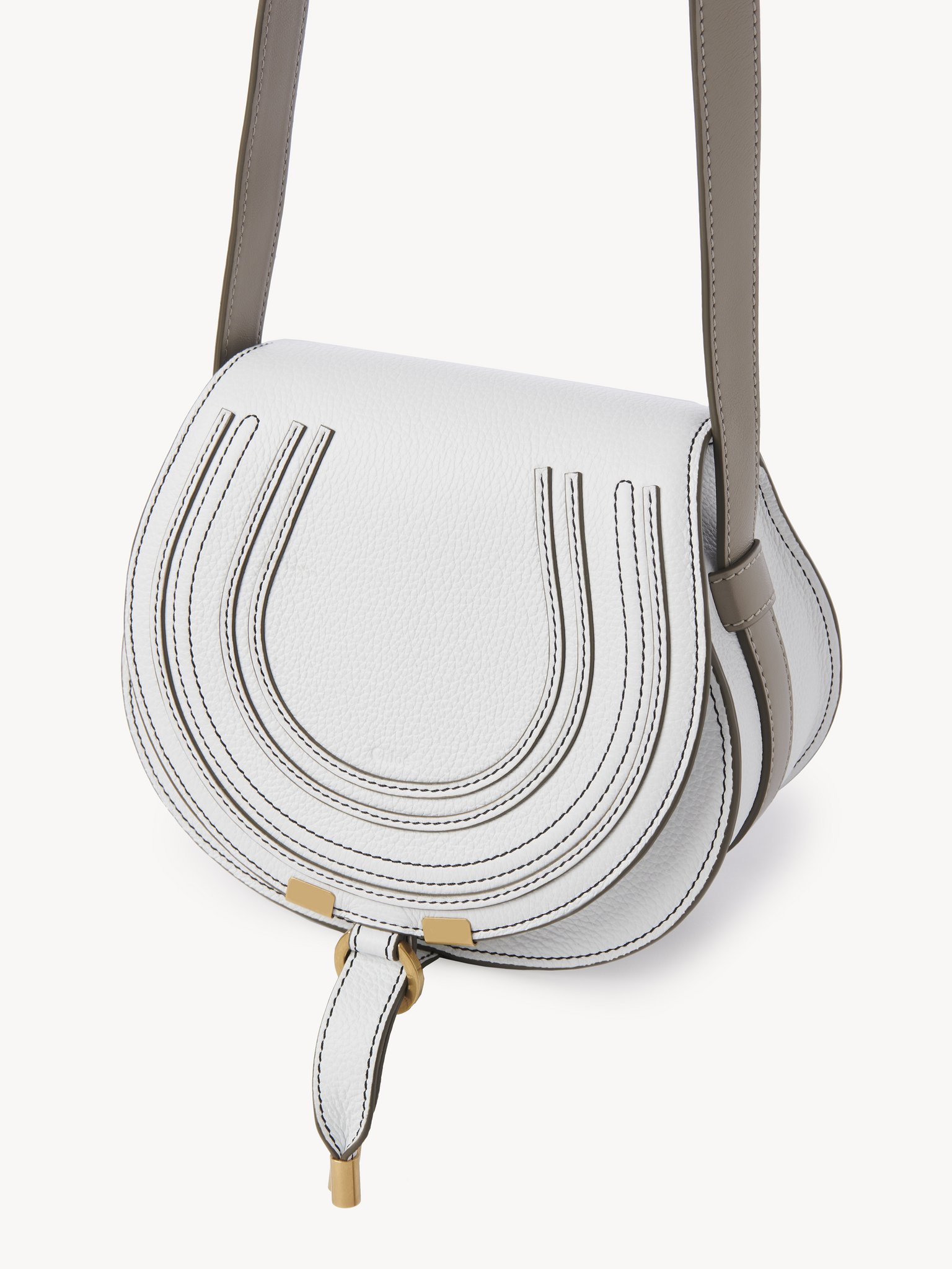 Small Marcie saddle bag in grained leather Bicolor grained calfskin with contrast stitching
Crystal White Top view of the product