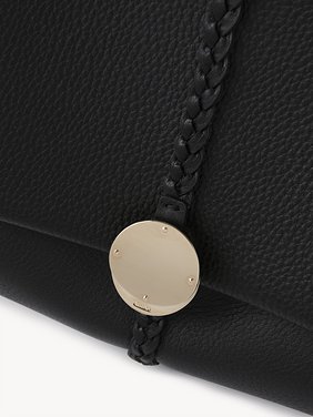 Large Penelope soft shoulder bag in grained leather Grained bull leather with leather braids
Black Product detail