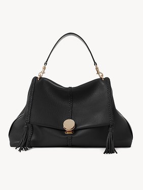 Large Penelope soft shoulder bag in grained leather Grained bull leather with leather braids
Black