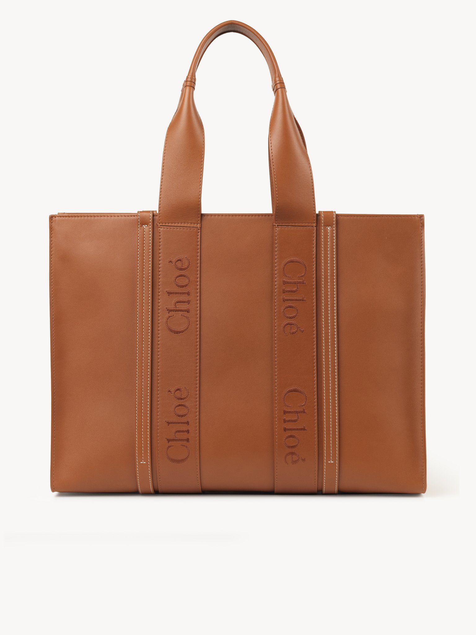 Large Woody tote bag in soft leather Smooth calfskin with Chloé logo
Caramel