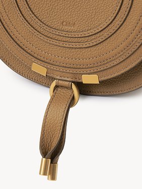 Small Marcie saddle bag in grained leather Grained calfskin
Pottery Brown Product detail