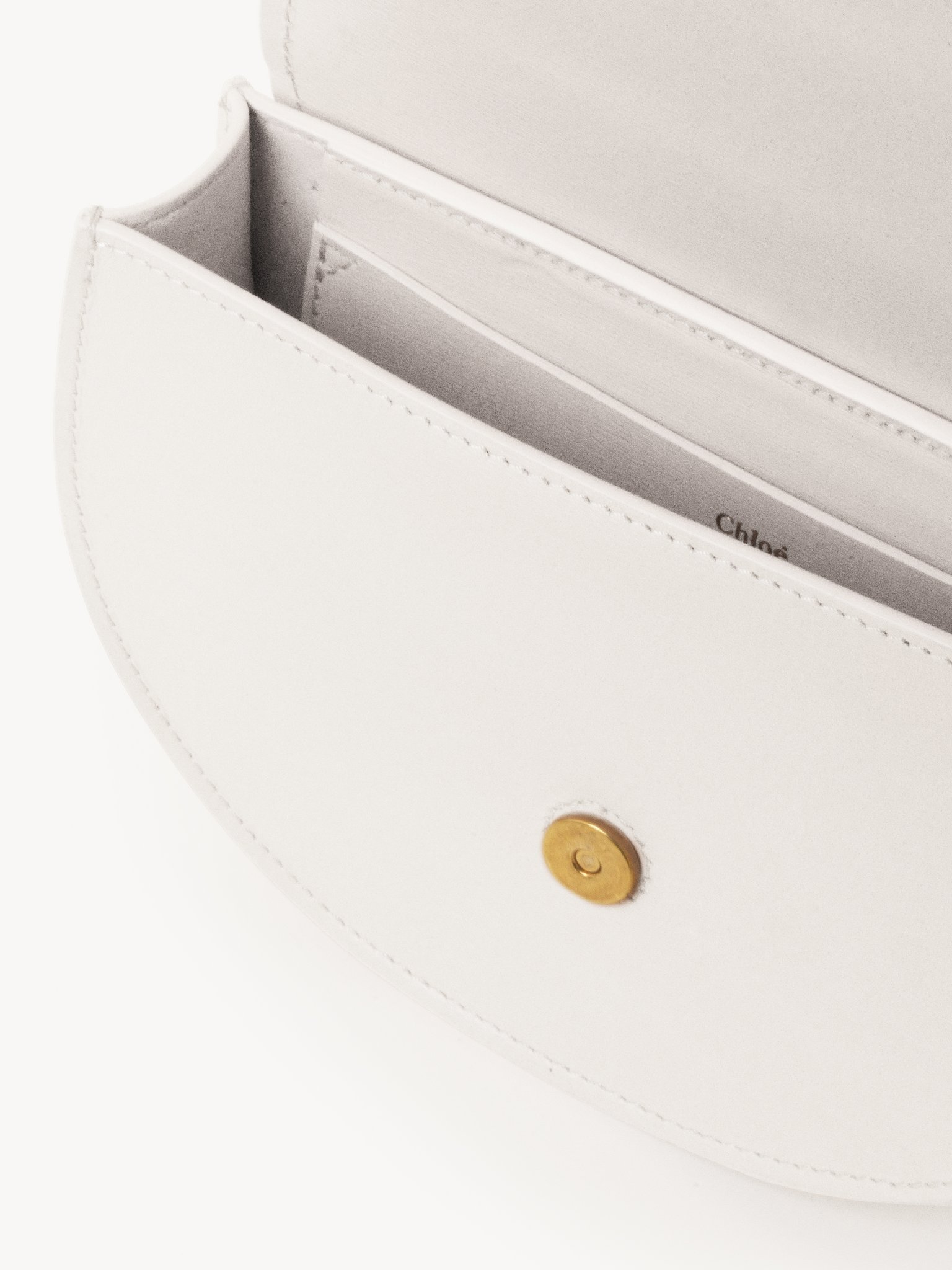 Mini Marcie flap bag in soft leather Smooth calfskin
Misty Ivory Front view of the product being worn