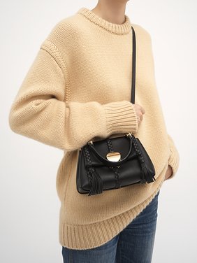 Mini Penelope soft shoulder bag in grained leather Grained bull leather with leather braids
Black [*** acc_altImage_shotG ***]