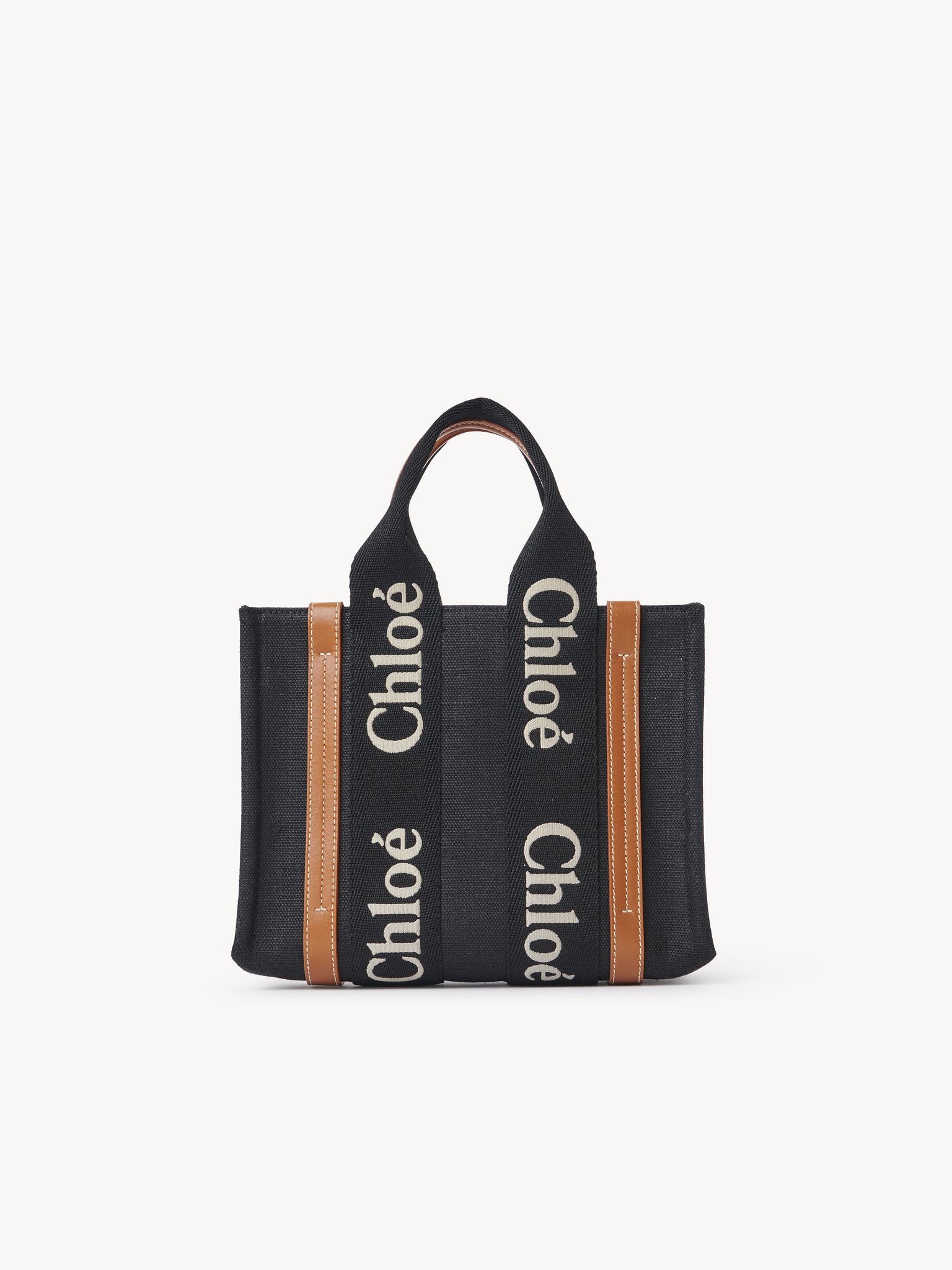 Small Woody tote bag in linen Linen canvas & shiny calfskin with Chloé logo
Black & Beige Product detail