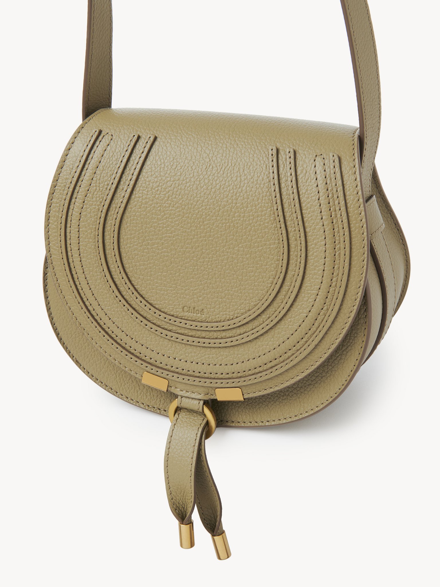 Marcie small saddle bag Grained calfskin
Pottery Green Product detail