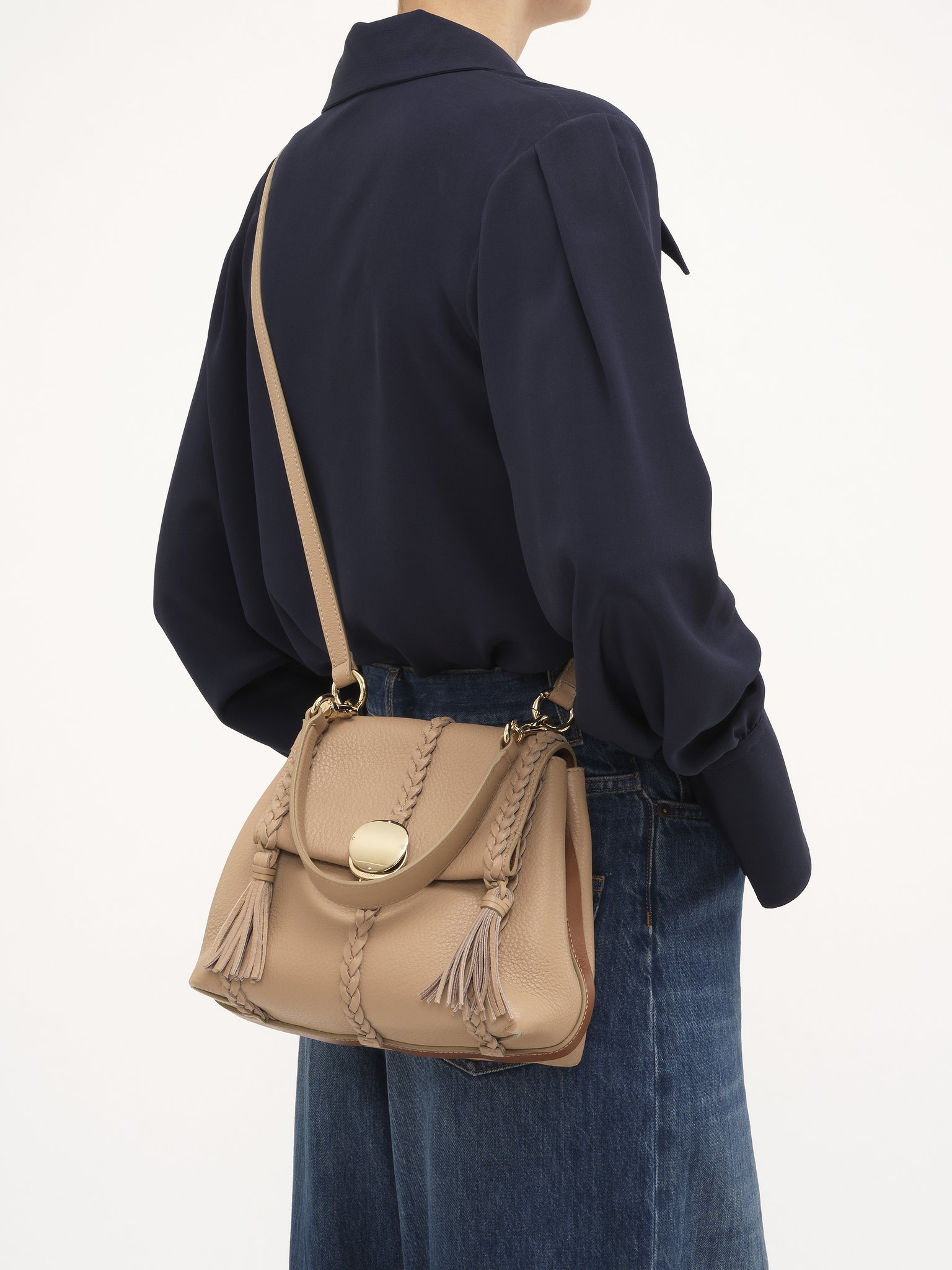 Small Penelope soft shoulder bag in grained leather Grained bull leather with leather braids
Nomad Beige 