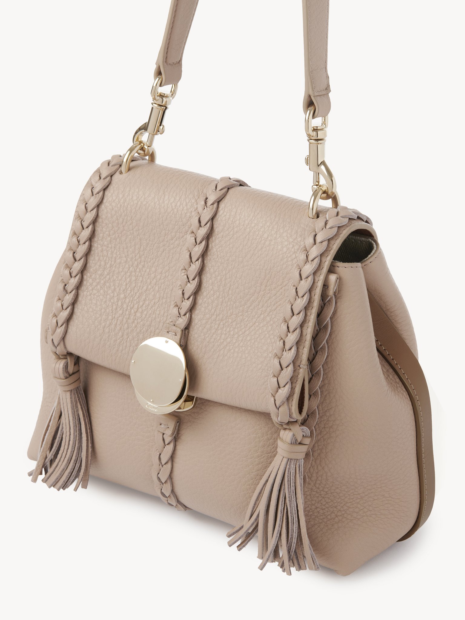 Small Penelope soft shoulder bag in grained leather Grained bull leather with leather braids
Nomad Beige 