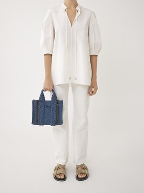 Small Woody tote bag in denim Recycled cotton denim & shiny calfskin with braided handles
Denim 