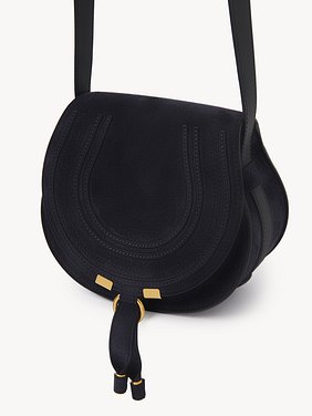 Marcie small saddle bag Suede calfskin
Midnight Blue Product detail