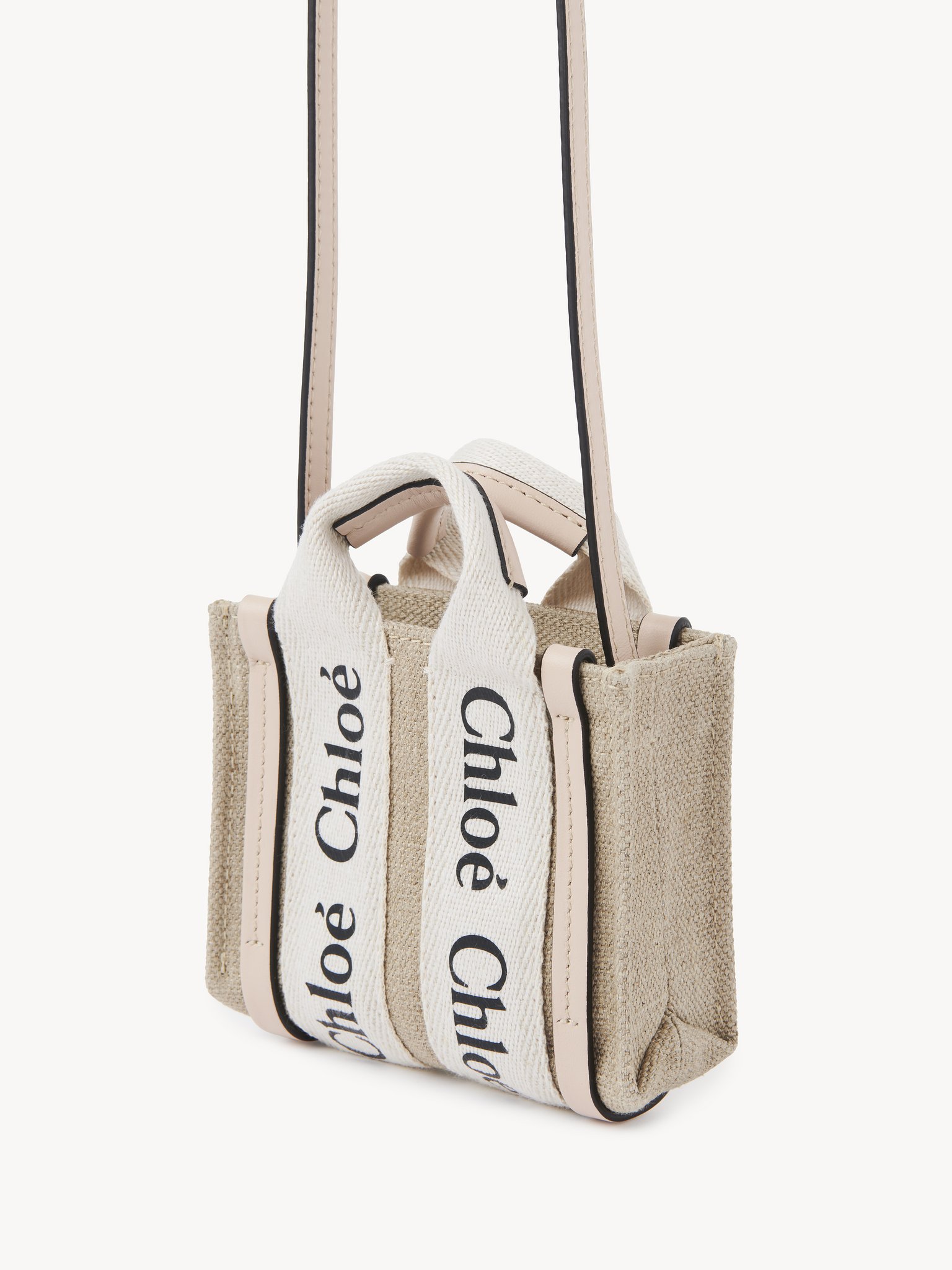 Nano Woody tote bag in linen Linen canvas & shiny calfskin with Chloé logo
Cement Pink Back view of the product