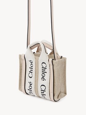 Nano Woody tote bag in linen Linen canvas & shiny calfskin with Chloé logo
Cement Pink Back view of the product