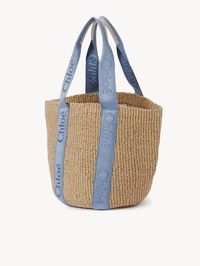 Large Woody tote bag in natural fibres Fair-trade paper, calfskin and webbing with Chloé logo
Washed Blue Product detail