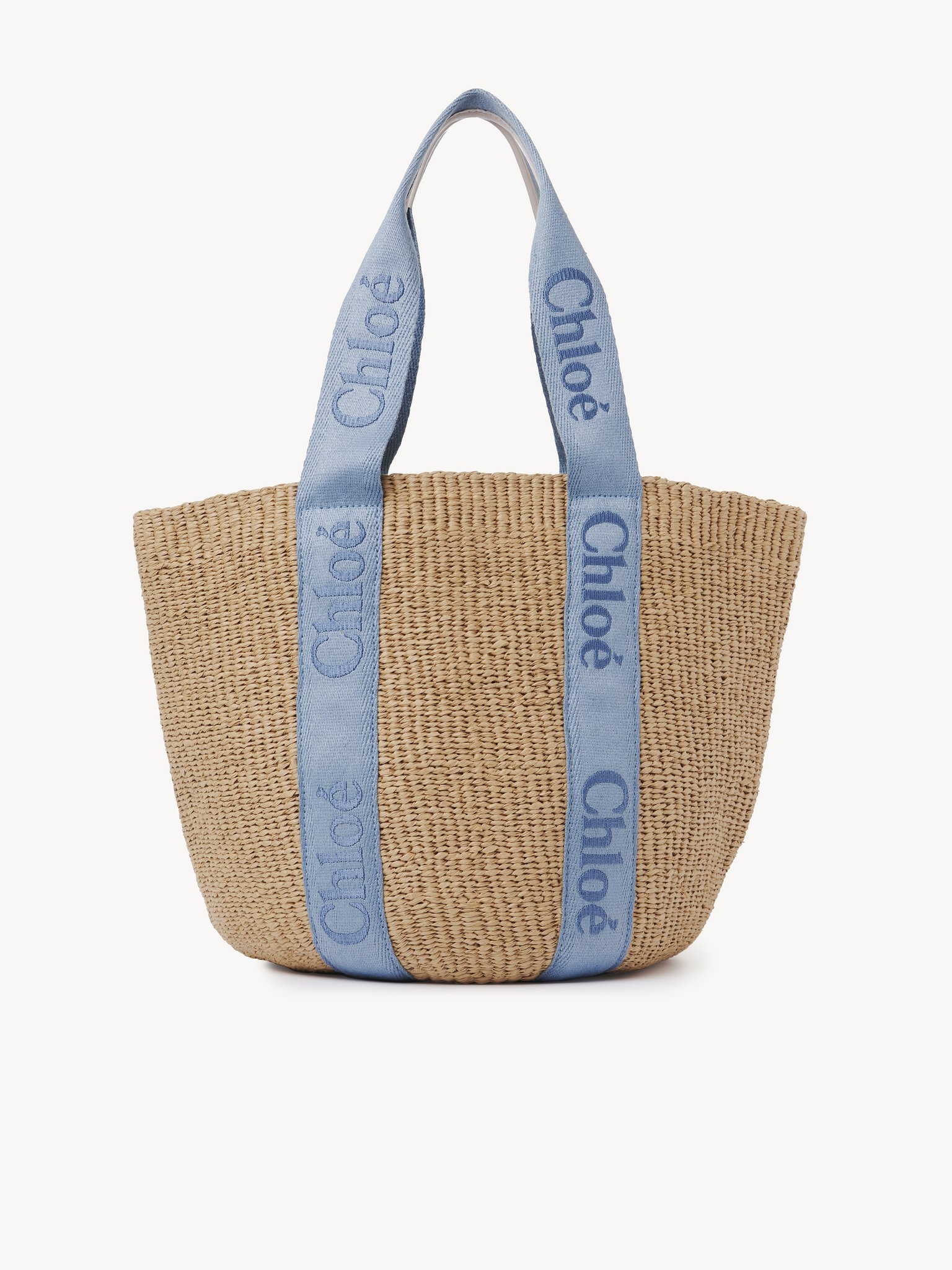 Large Woody tote bag in natural fibres Fair-trade paper, calfskin and webbing with Chloé logo
Washed Blue Top view of the product