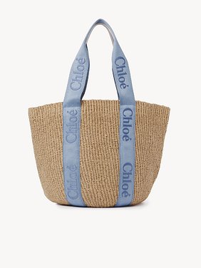 Large Woody tote bag in natural fibres Fair-trade paper, calfskin and webbing with Chloé logo
Washed Blue Top view of the product