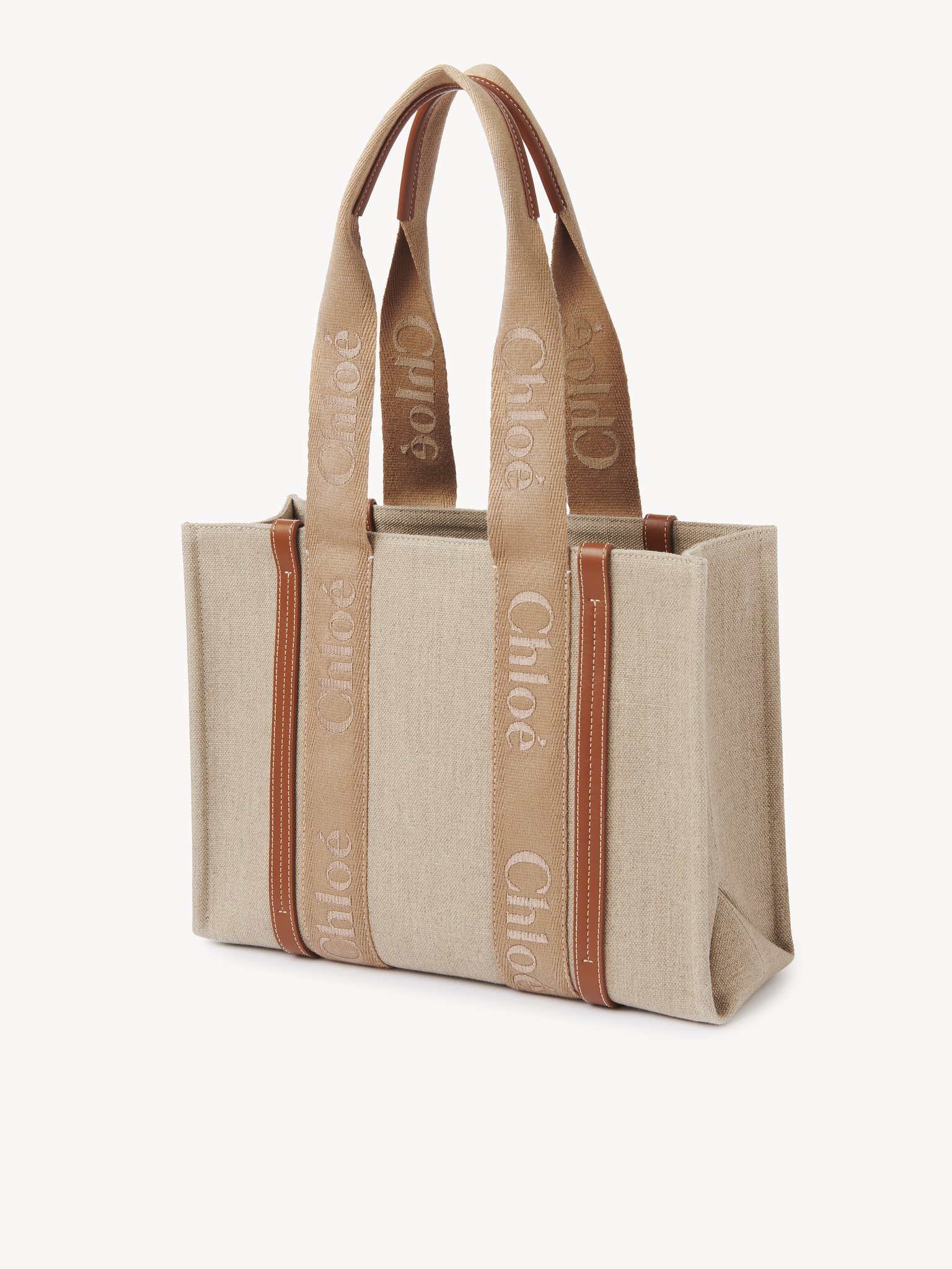 Woody tote bag in linen Linen canvas, calfskin & webbing with Chloé logo
Soft Tan Product detail