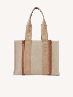 Woody tote bag in linen Linen canvas, calfskin & webbing with Chloé logo
Soft Tan Top view of the product