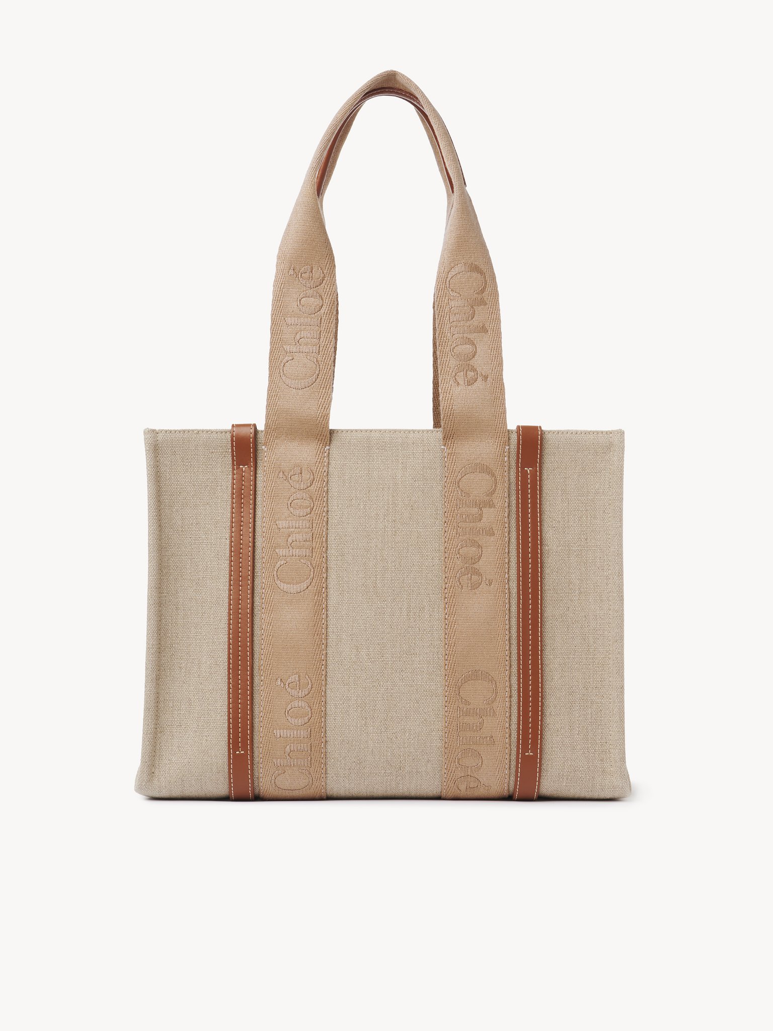 Woody tote bag in linen Linen canvas, calfskin & webbing with Chloé logo
Soft Tan