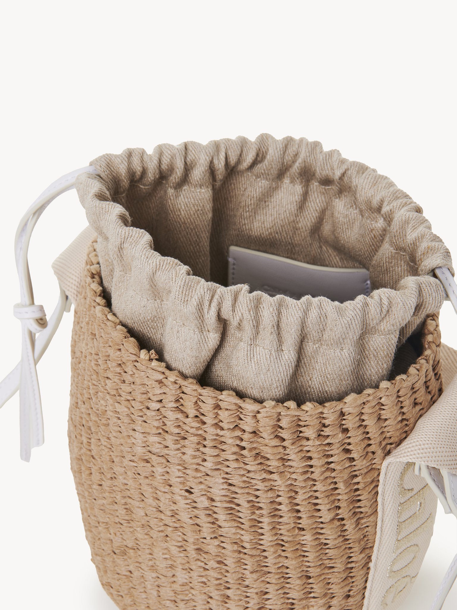 Small Woody basket in natural fibres Fair-trade paper & lurex webbing with Chloé logo
Gold Front view of the product being worn