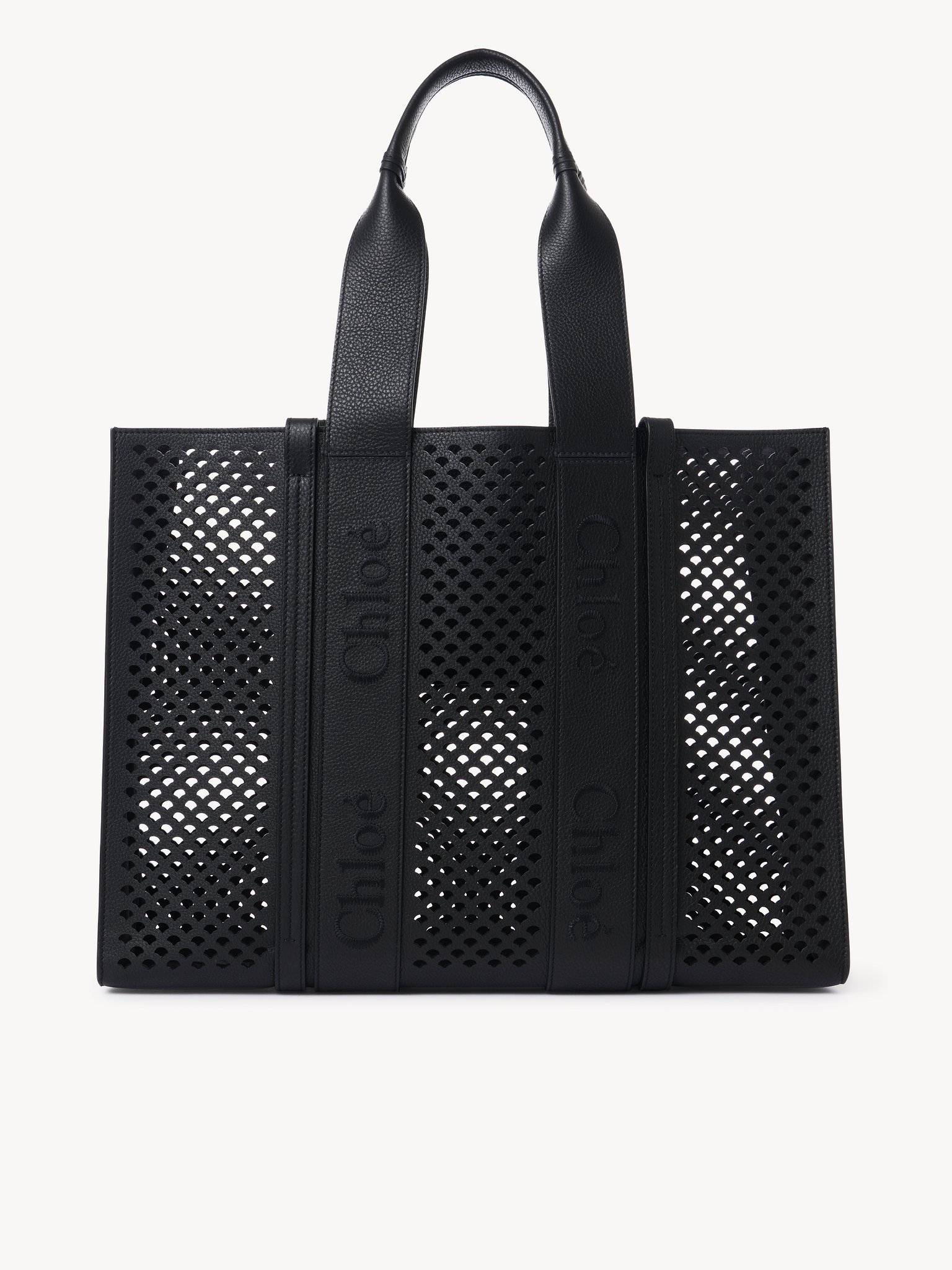 Tote bag grande Woody in pelle granata Pelle di vitello granata con bordi ondulati traforati e logo Chloé
Black