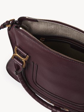 Marcie bag in grained leather Grained calfskin
Dimness Purple Front view of the product being worn