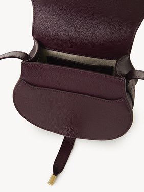 Small Marcie saddle bag in grained leather Grained calfskin
Dimness Purple Front view of the product being worn