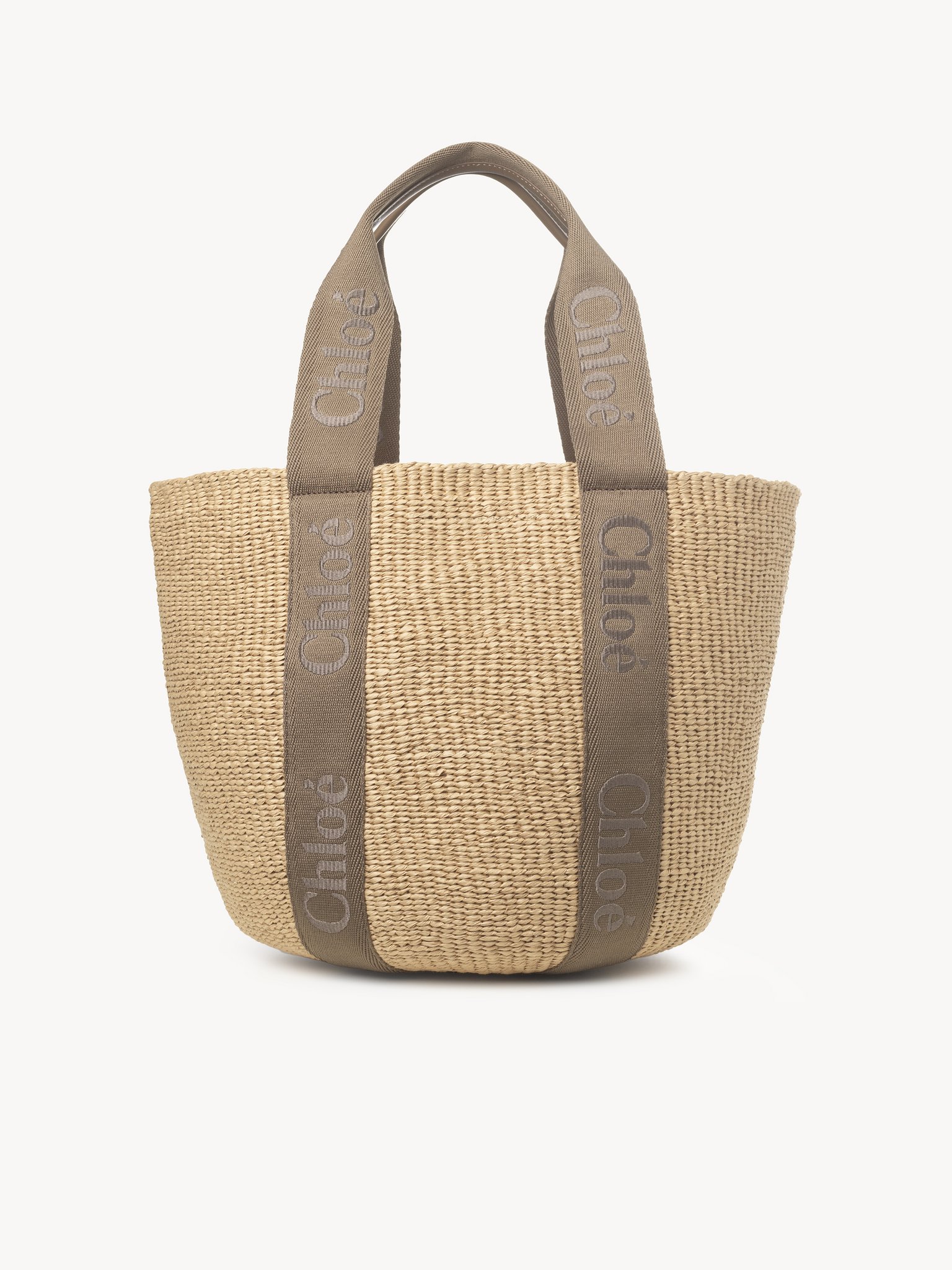 Large Woody basket in fair-trade natural fibers Fair-trade paper, calfskin & webbing with Chloé logo embroidery
Dark Nut Top view of the product