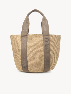 Large Woody basket in fair-trade natural fibers Fair-trade paper, calfskin & webbing with Chloé logo embroidery
Dark Nut