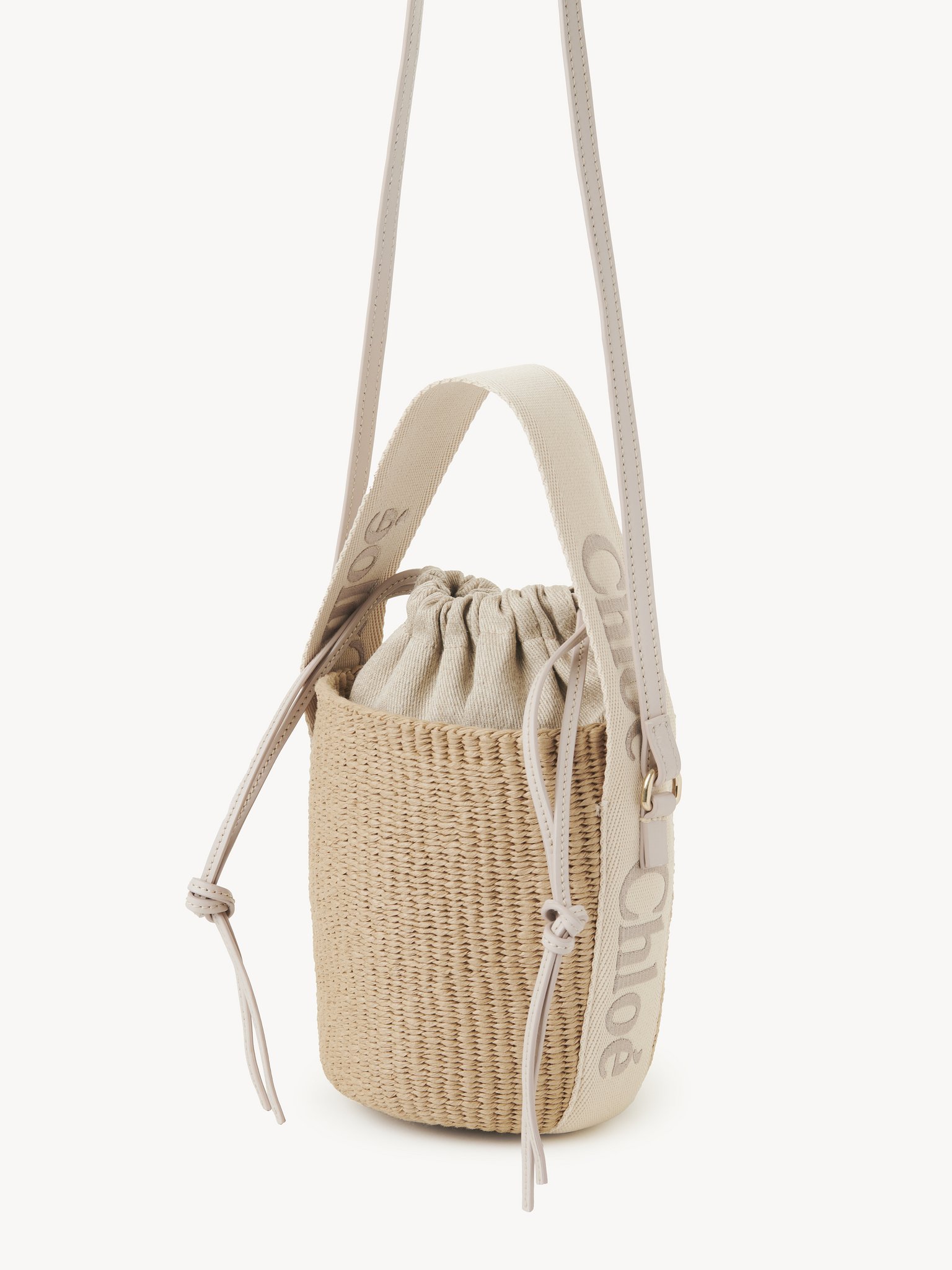 Small Woody basket in natural fibers Fair-trade paper, calfskin & webbing with Chloé logo
Wild Grey Product detail