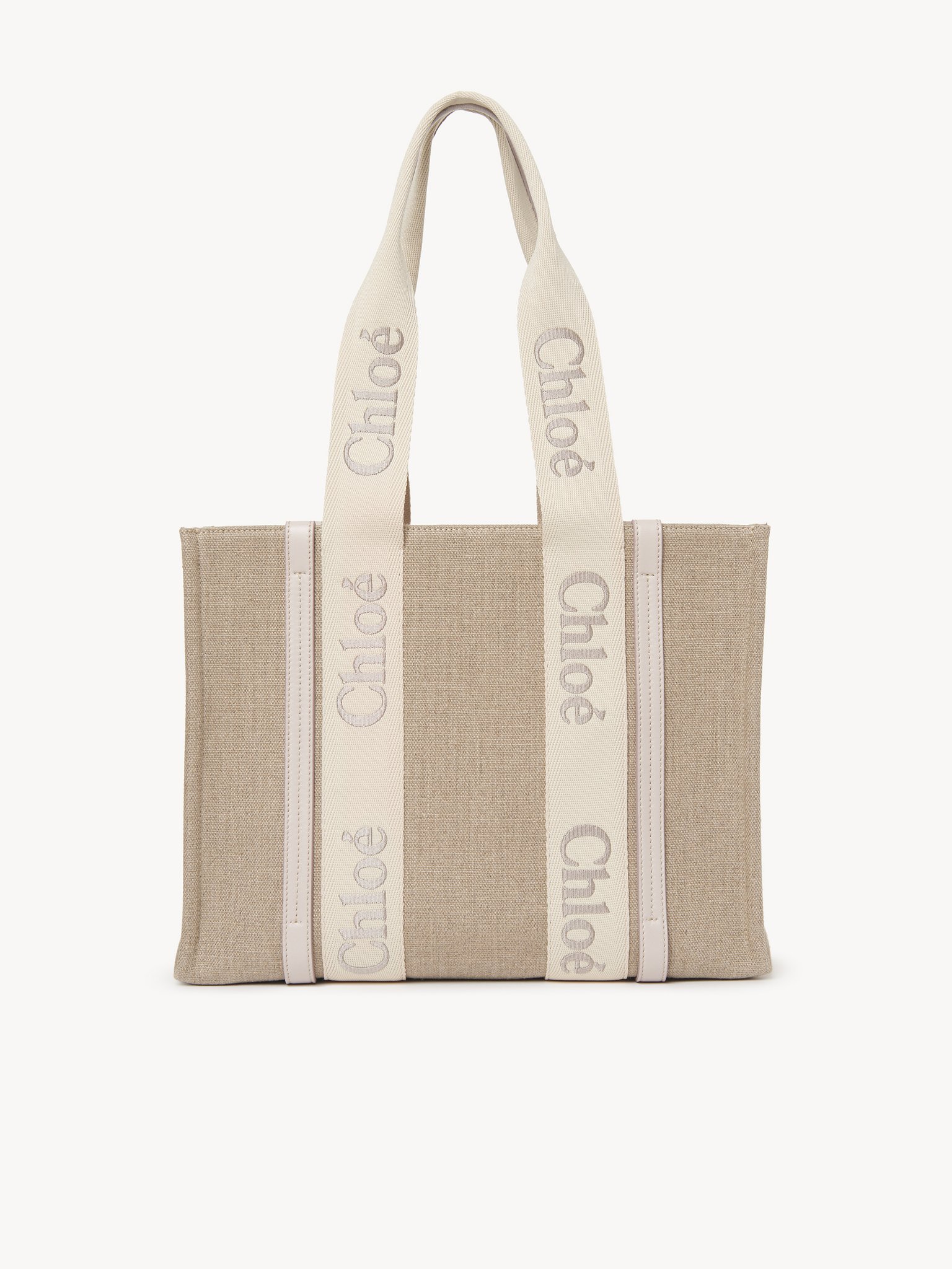 Woody tote bag in linen Linen canvas, calfskin and webbing with Chloé logo embroidery
Wild Grey