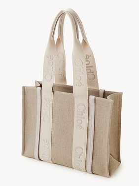 Woody tote bag in linen Linen canvas, calfskin and webbing with Chloé logo embroidery
Wild Grey Product detail