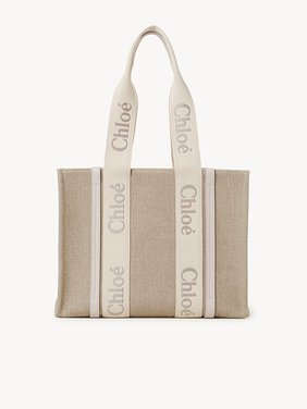 Woody tote bag in linen Linen canvas, calfskin and webbing with Chloé logo embroidery
Wild Grey 