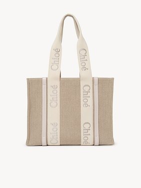 Woody tote bag in linen Linen canvas, calfskin and webbing with Chloé logo embroidery
Wild Grey