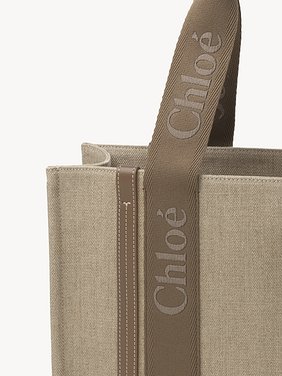 Woody tote bag in linen Linen canvas, calfskin and webbing with Chloé logo embroidery
Dark Nut 