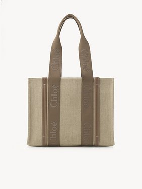 Woody tote bag in linen Linen canvas, calfskin and webbing with Chloé logo embroidery
Dark Nut 