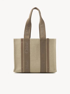 Woody tote bag in linen Linen canvas, calfskin and webbing with Chloé logo embroidery
Dark Nut