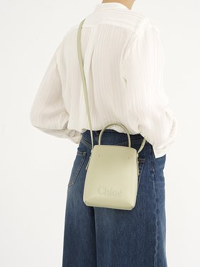 Micro Chloé Sense tote bag in leather Shiny calfskin
Light Eucalyptus Front view of the product being worn