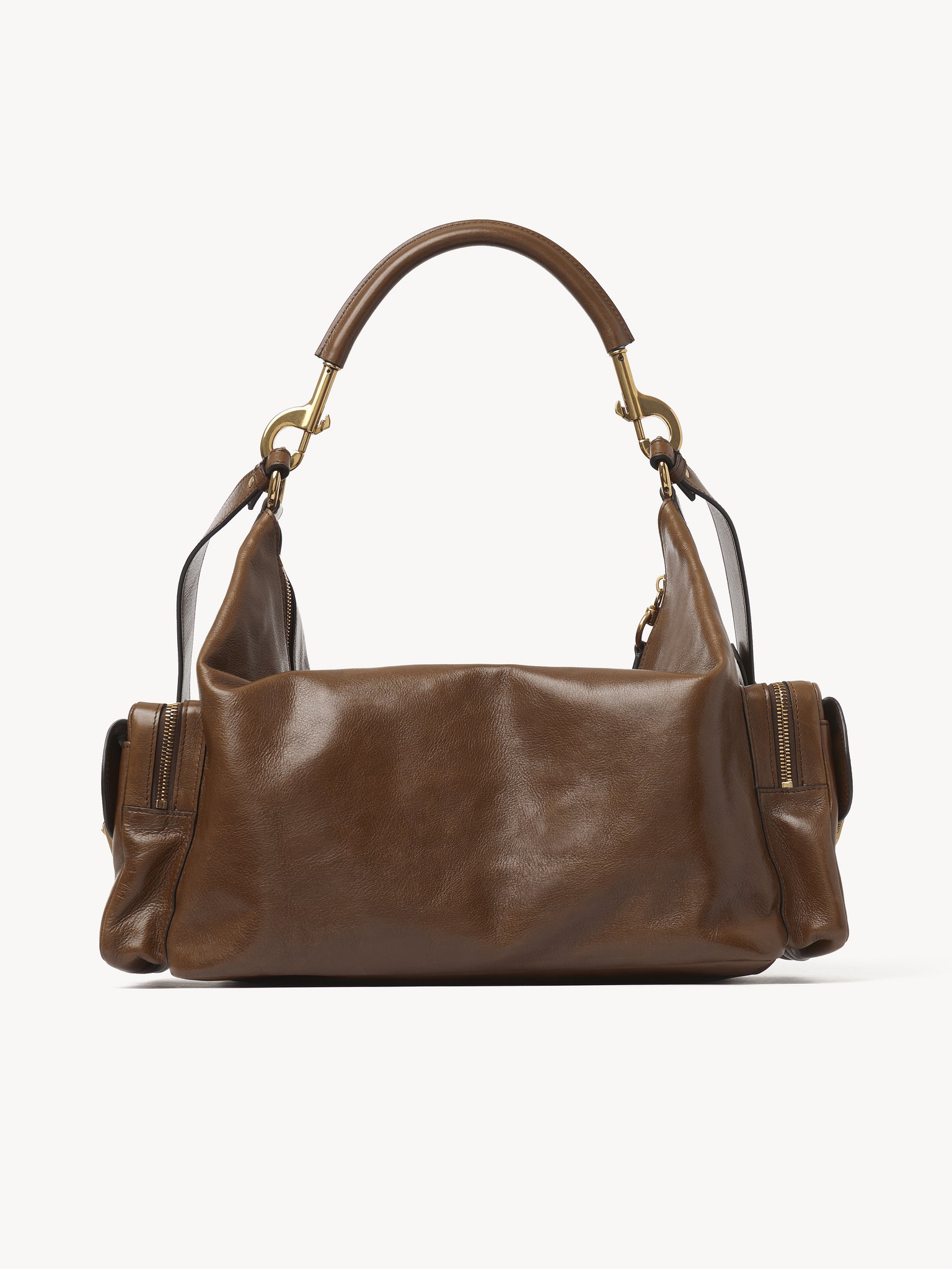 Large Camera bag in shiny leather Natural shiny buffalo leather
Dark Khaki Top view of the product