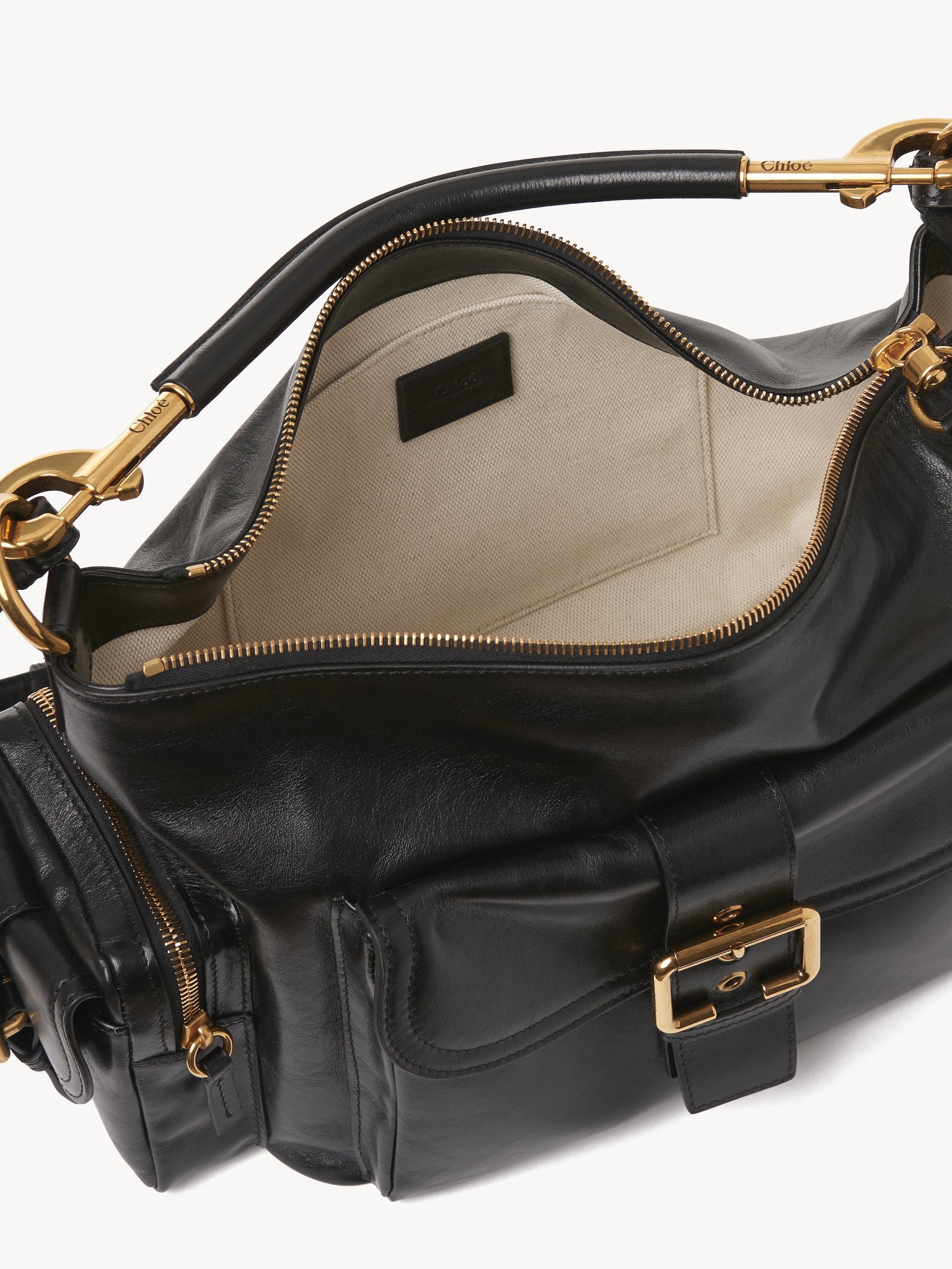 Camera bag in shiny leather Natural shiny buffalo leather
Black 