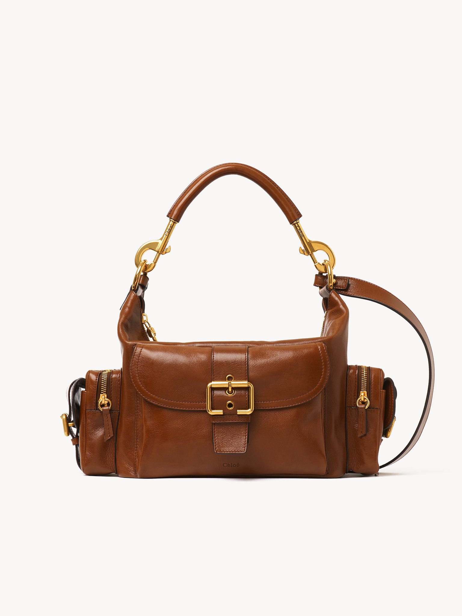 Camera bag in shiny leather Natural shiny buffalo leather
Clay Brown