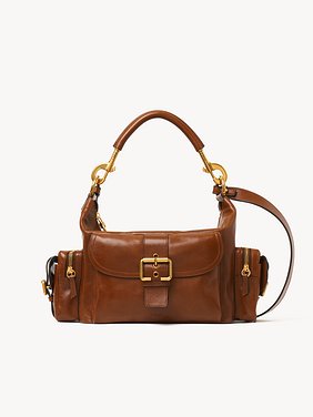 Camera bag in shiny leather Natural shiny buffalo leather
Clay Brown