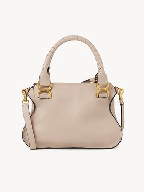 Bolso pequeño Marcie de cuero brillante Cuero de becerro brillante
Deep Beige Vista superior del artículo